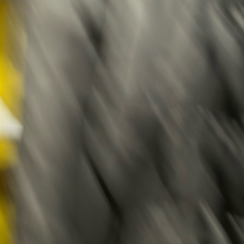 Black Puffer Jacket with Yellow Accents - Picture 3 of 7